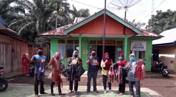 Cegah penularan Covid 19, Pemdes Taba Baru Bagikan Ribuan Masker Gratis
