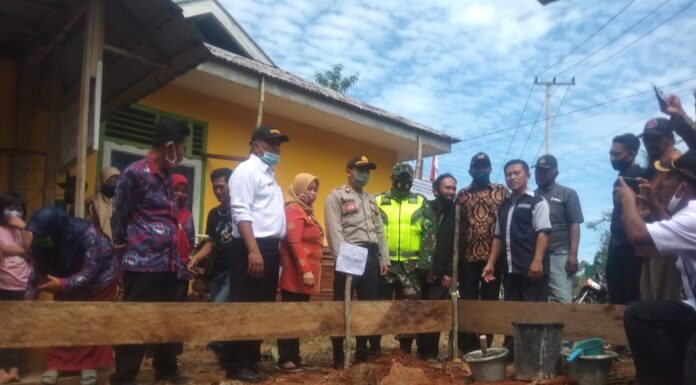 Desa Padang Ulak Tanjung Titik Nol Bangun Gedung Seba Guna