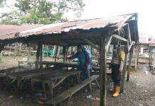 Pospol XIV Koto Bersama Pemdes Semprot Disinfektan Dan Himbau Prokes Covid-19